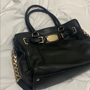 Classy MK BAG. No pulls or tears. Several pockets.